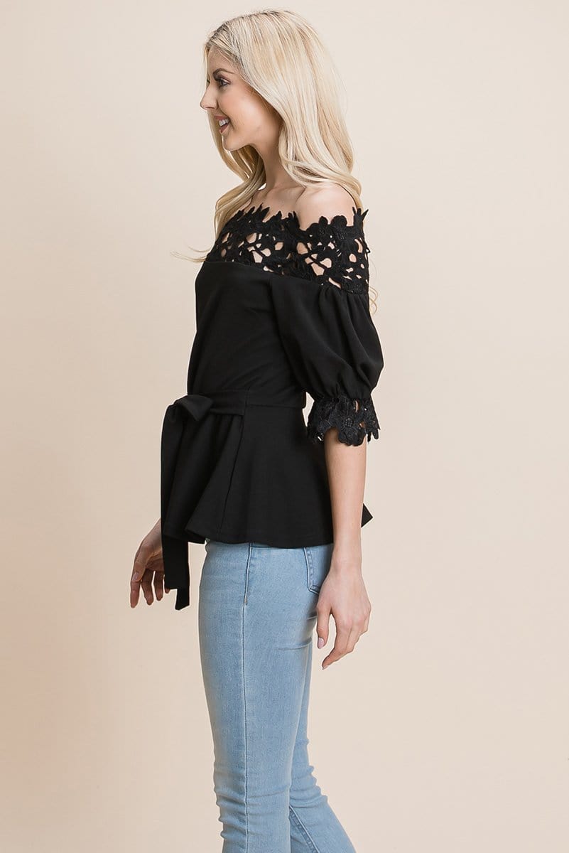 A stylish Lace Crochet Self Belted Off The Shoulder Top featuring floral lace applique, half lace trim sleeves, and a hidden back zipper.