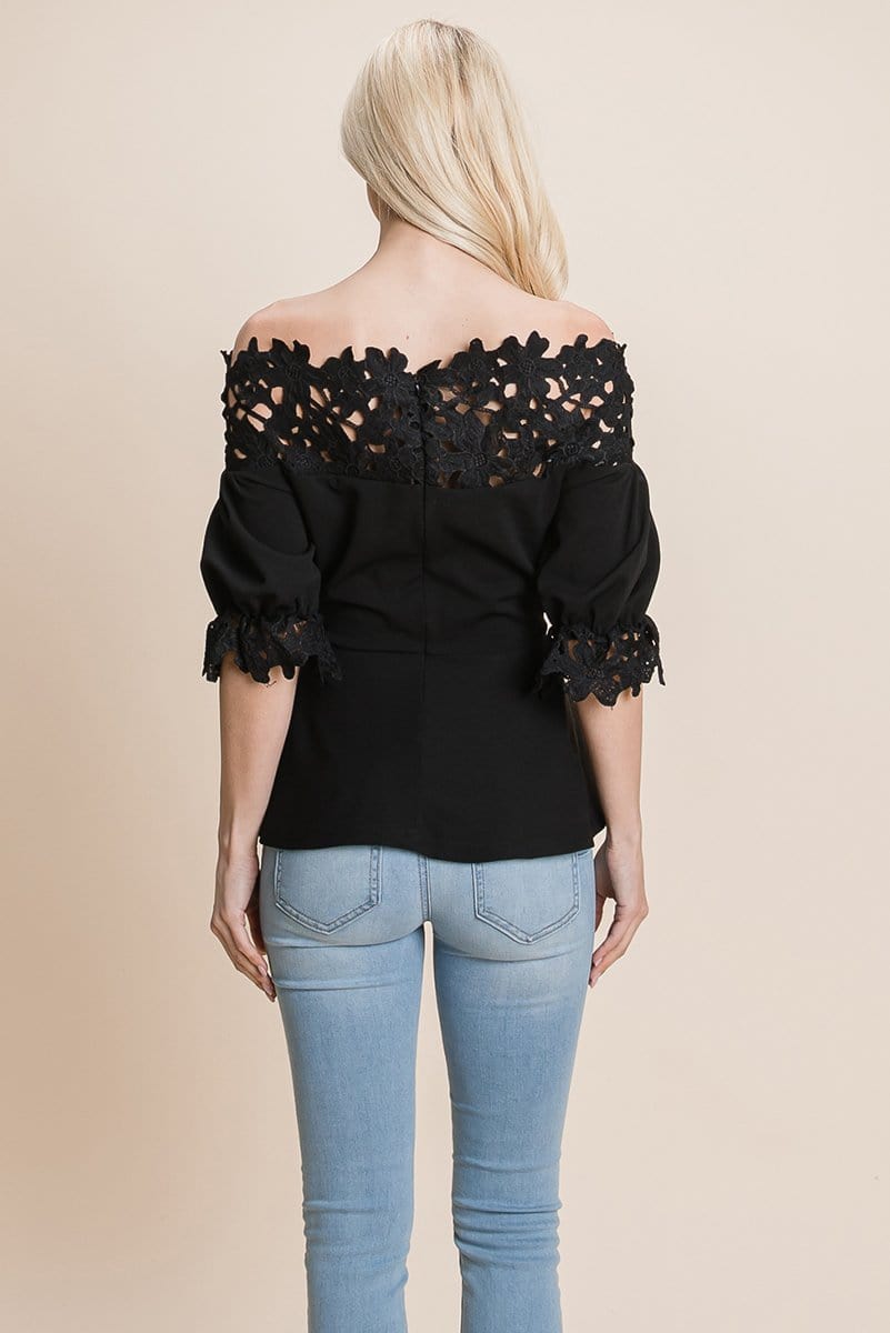 A stylish Lace Crochet Self Belted Off The Shoulder Top featuring floral lace applique, half lace trim sleeves, and a hidden back zipper.