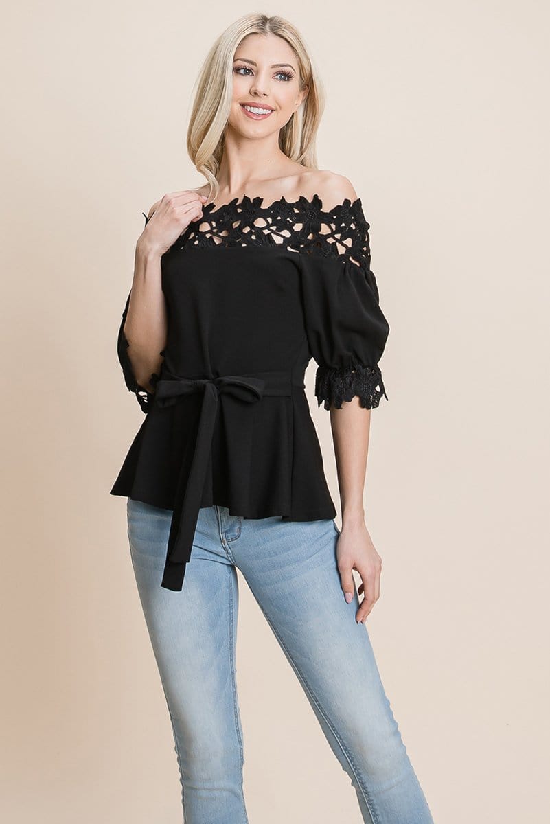 A stylish Lace Crochet Self Belted Off The Shoulder Top featuring floral lace applique, half lace trim sleeves, and a hidden back zipper.