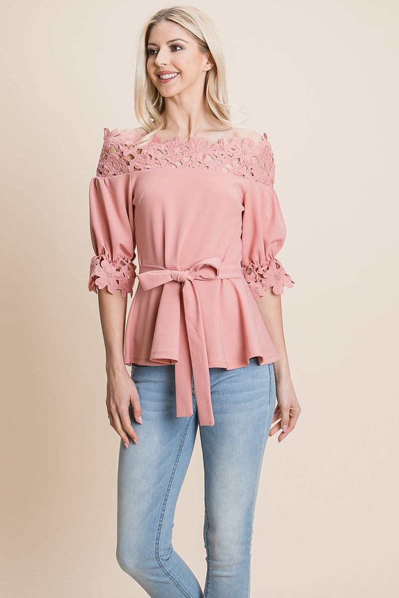 A stylish Lace Crochet Self Belted Off The Shoulder Top featuring floral lace applique, half lace trim sleeves, and a hidden back zipper.