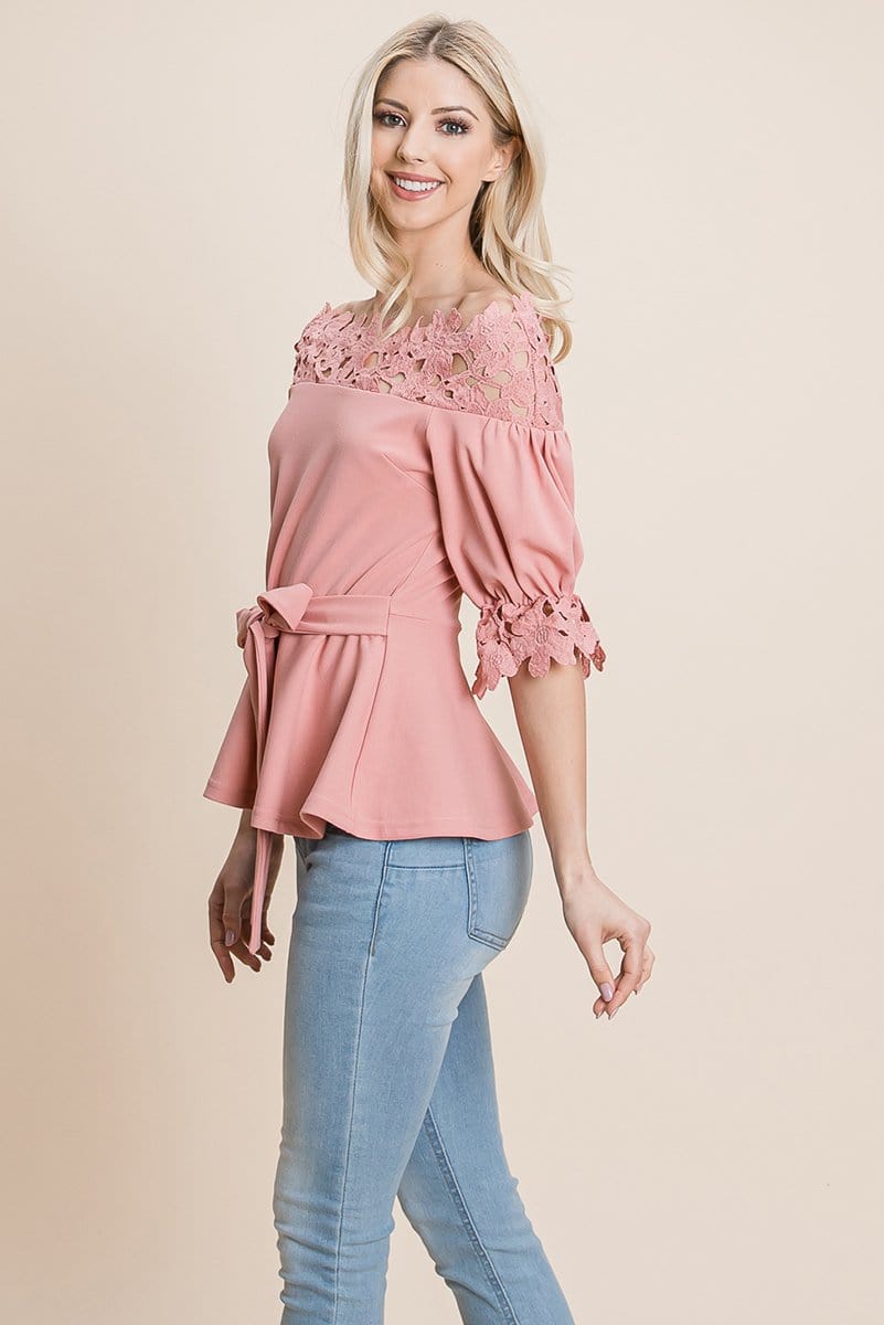 A stylish Lace Crochet Self Belted Off The Shoulder Top featuring floral lace applique, half lace trim sleeves, and a hidden back zipper.