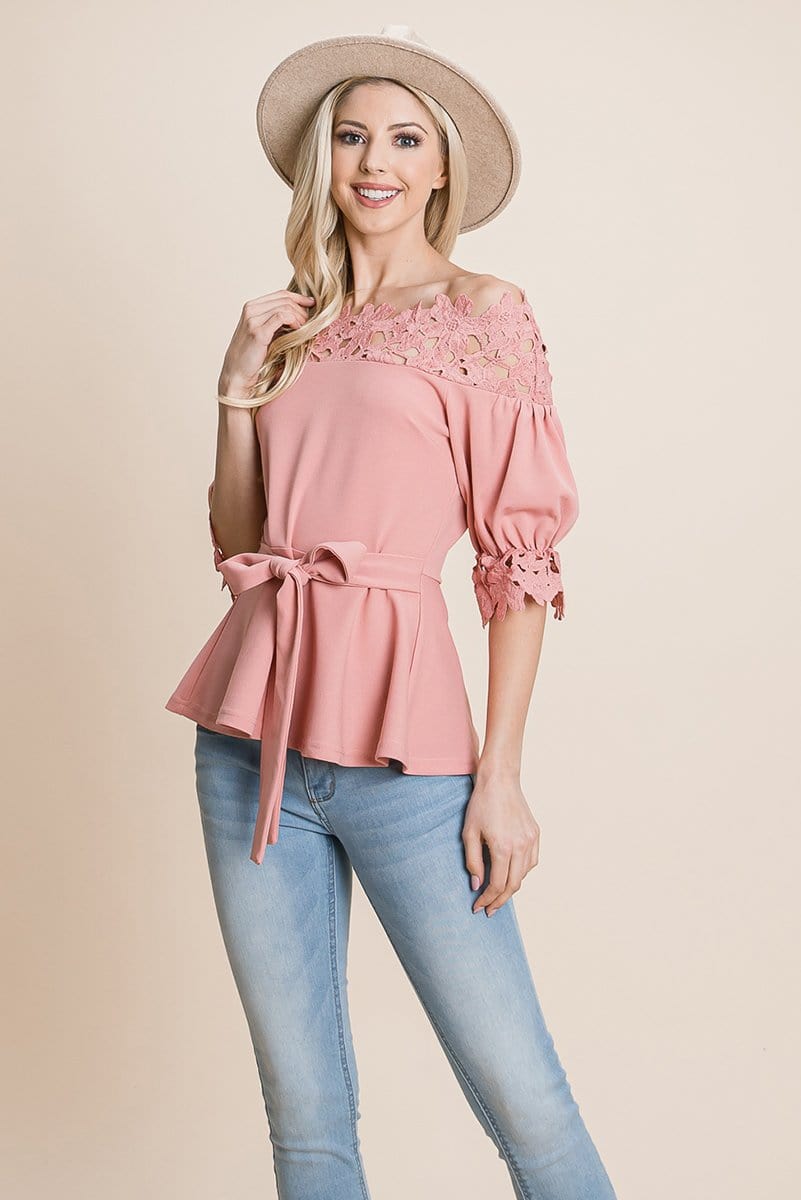 A stylish Lace Crochet Self Belted Off The Shoulder Top featuring floral lace applique, half lace trim sleeves, and a hidden back zipper.