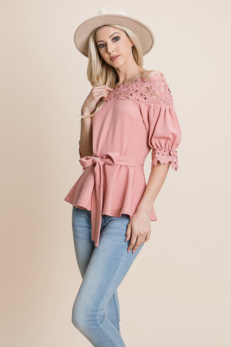 A stylish Lace Crochet Self Belted Off The Shoulder Top featuring floral lace applique, half lace trim sleeves, and a hidden back zipper.