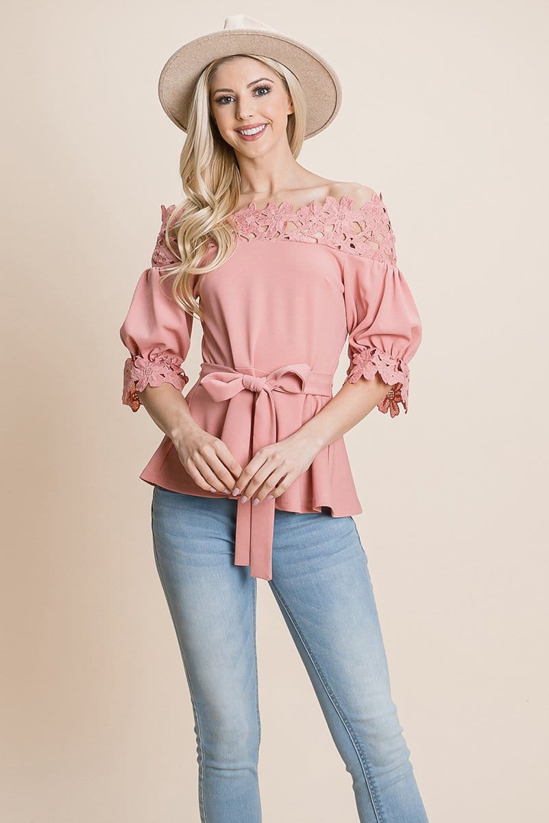 A stylish Lace Crochet Self Belted Off The Shoulder Top featuring floral lace applique, half lace trim sleeves, and a hidden back zipper.