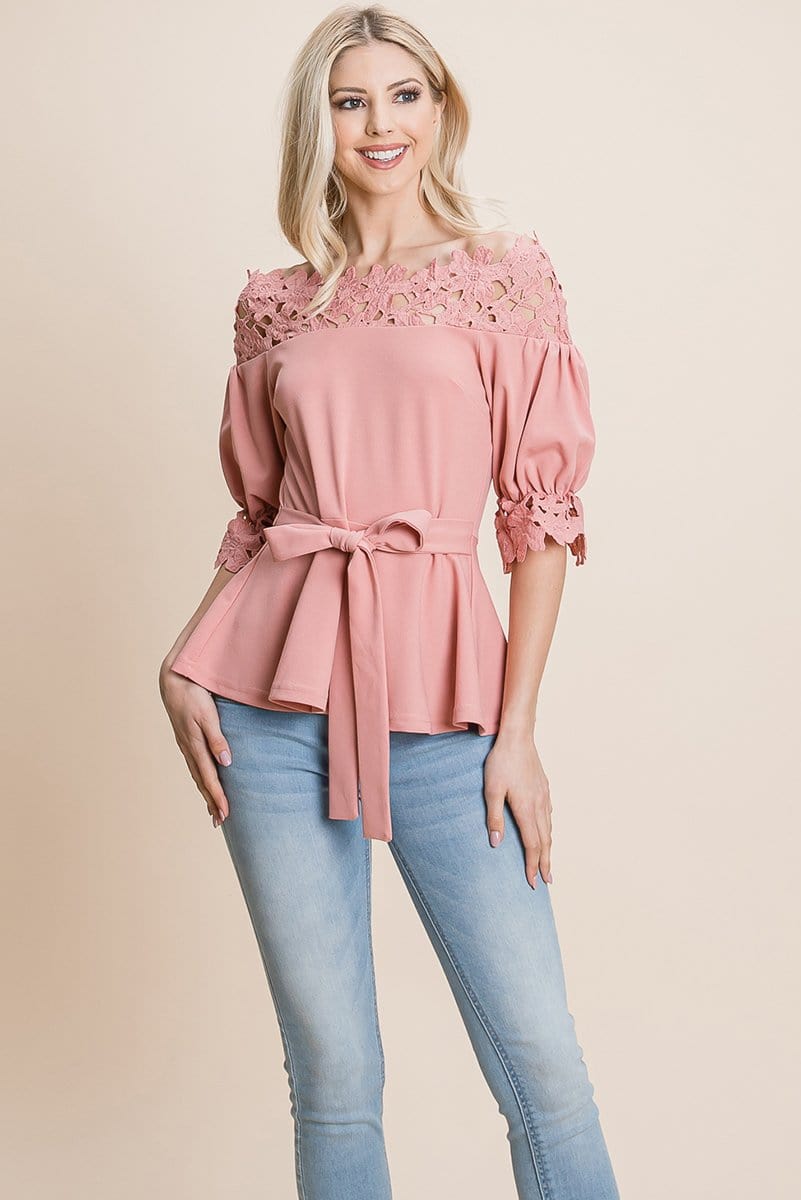 A stylish Lace Crochet Self Belted Off The Shoulder Top featuring floral lace applique, half lace trim sleeves, and a hidden back zipper.