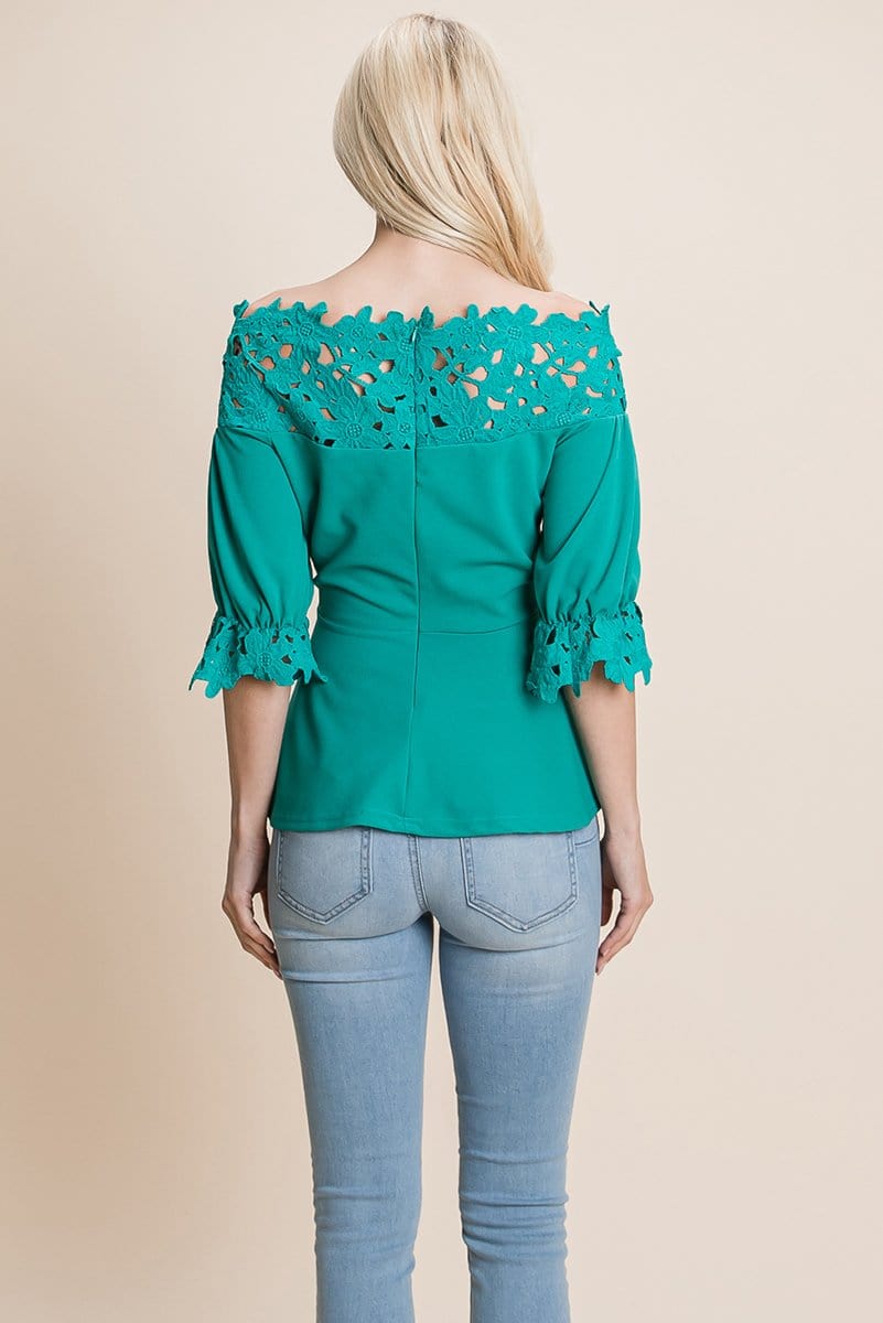 A stylish Lace Crochet Self Belted Off The Shoulder Top featuring floral lace applique, half lace trim sleeves, and a hidden back zipper.