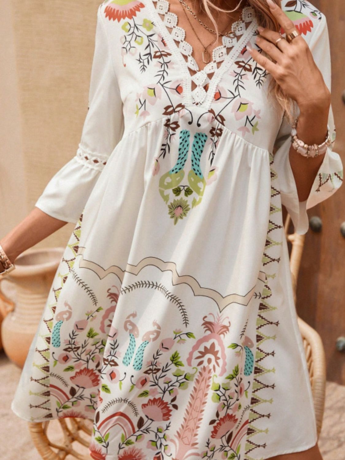 Lace Detail Printed Three-Quarter Sleeve Dress featuring elegant lace accents and semi-sheer fabric, perfect for various occasions.