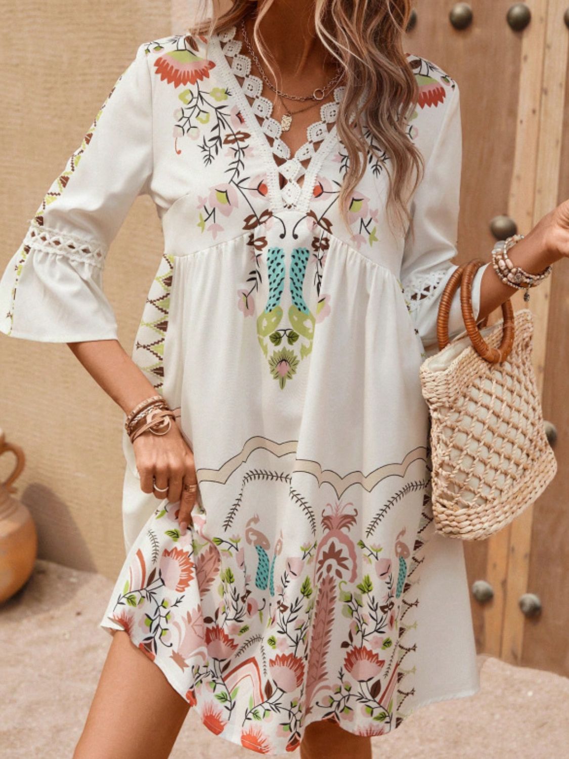 Lace Detail Printed Three-Quarter Sleeve Dress featuring elegant lace accents and semi-sheer fabric, perfect for various occasions.