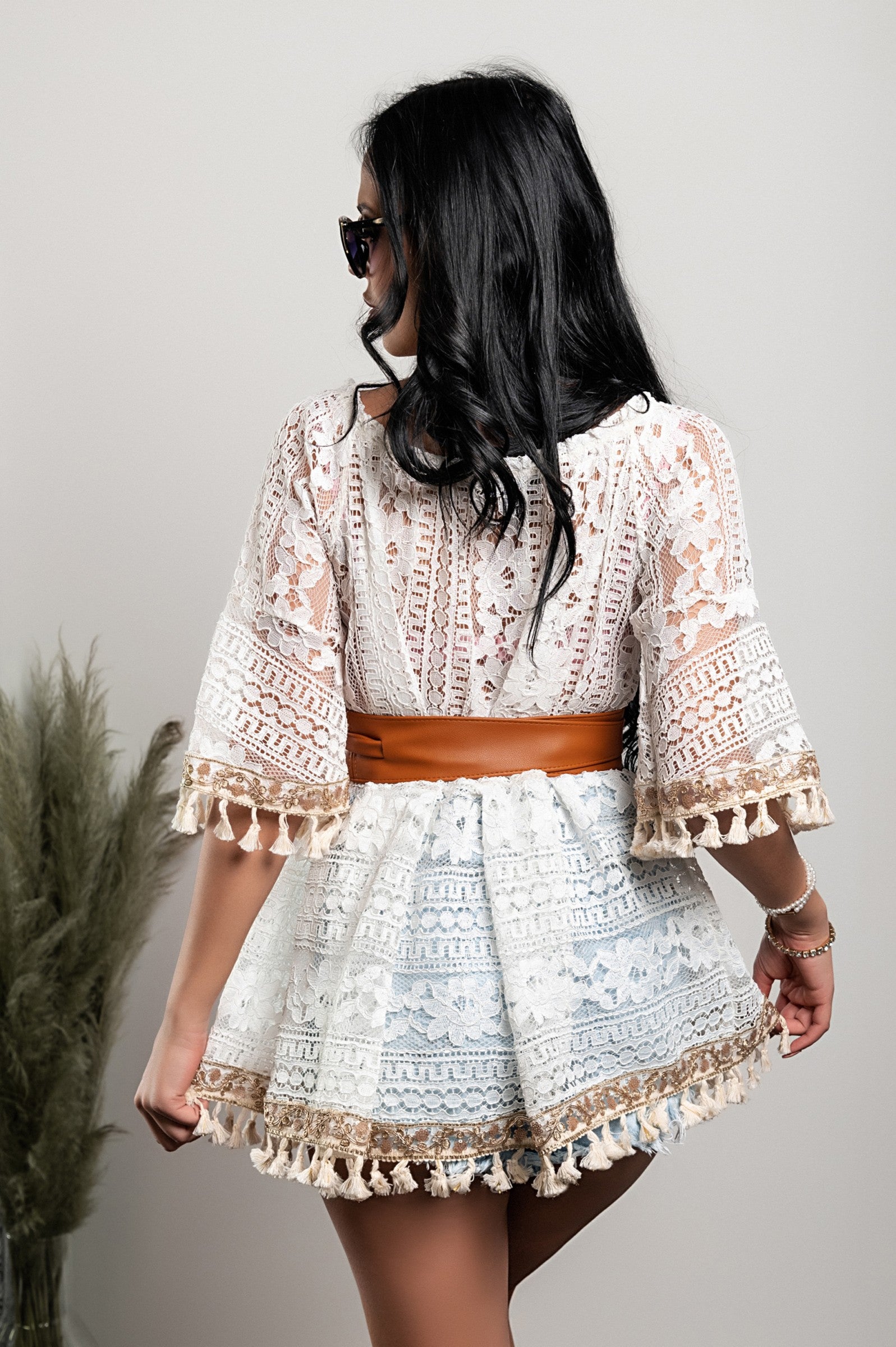 Beige lace mini summer dress Bangui with round neck and 3/4 sleeves, featuring decorative lace details.