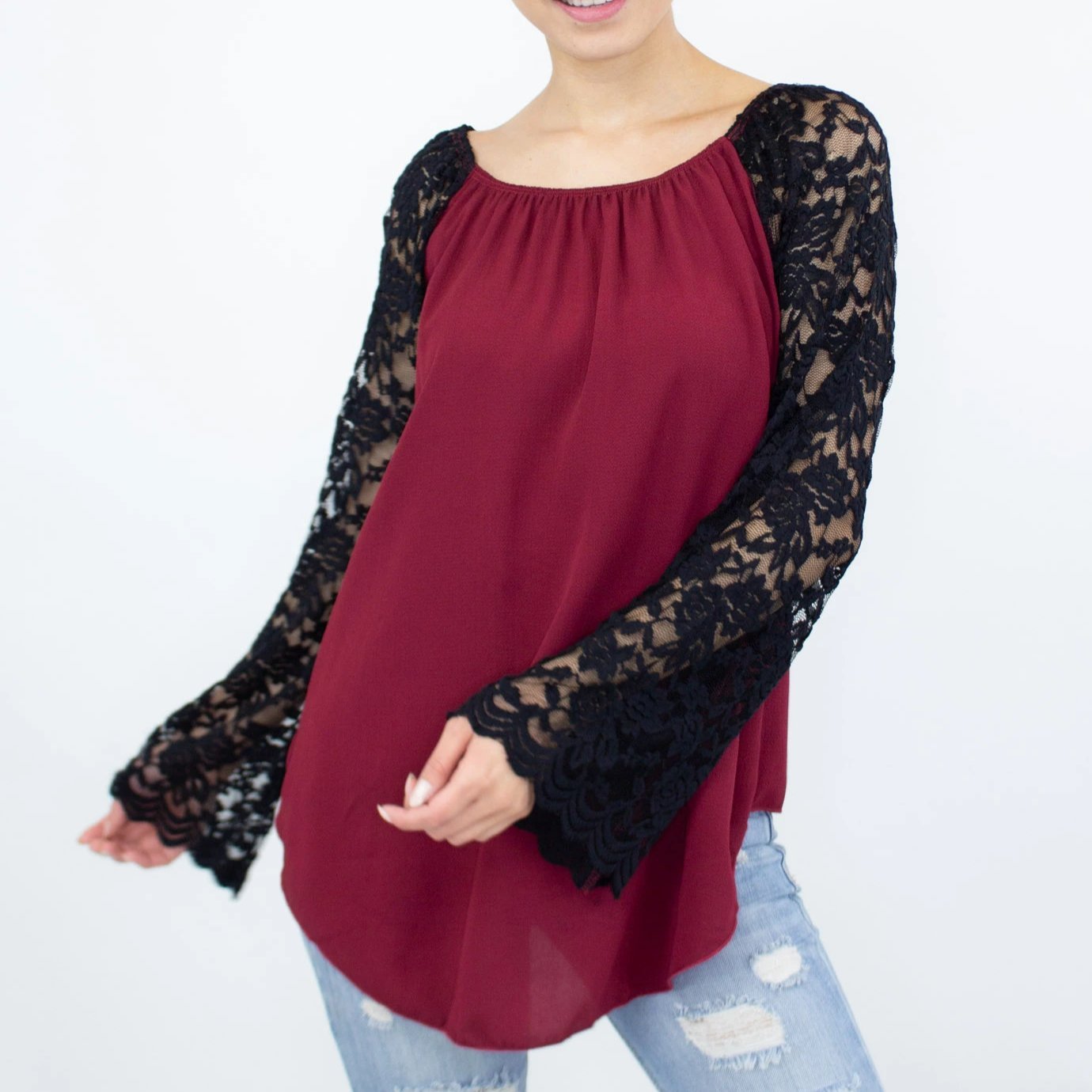 Burgundy Lace Sleeve Backless Top featuring elegant lace sleeves and a stylish back slit, perfect for casual and chic occasions.