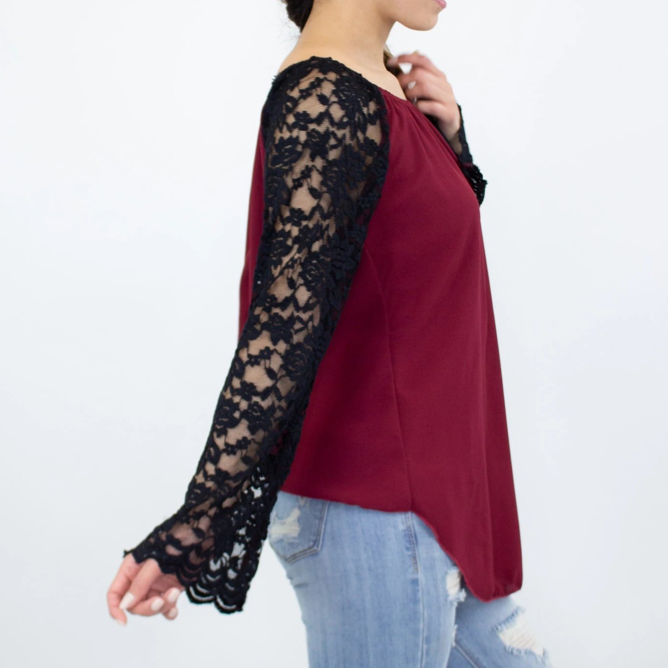 Burgundy Lace Sleeve Backless Top featuring elegant lace sleeves and a stylish back slit, perfect for casual and chic occasions.