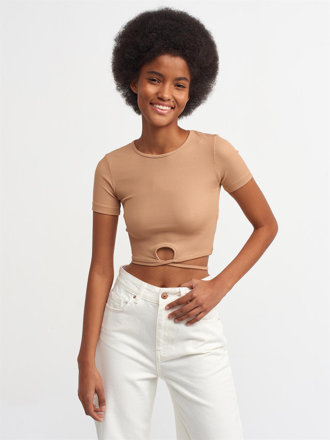 A stylish Lace Up Crop Top featuring a chic lace-up front design, made from a comfortable nylon-elastane blend.