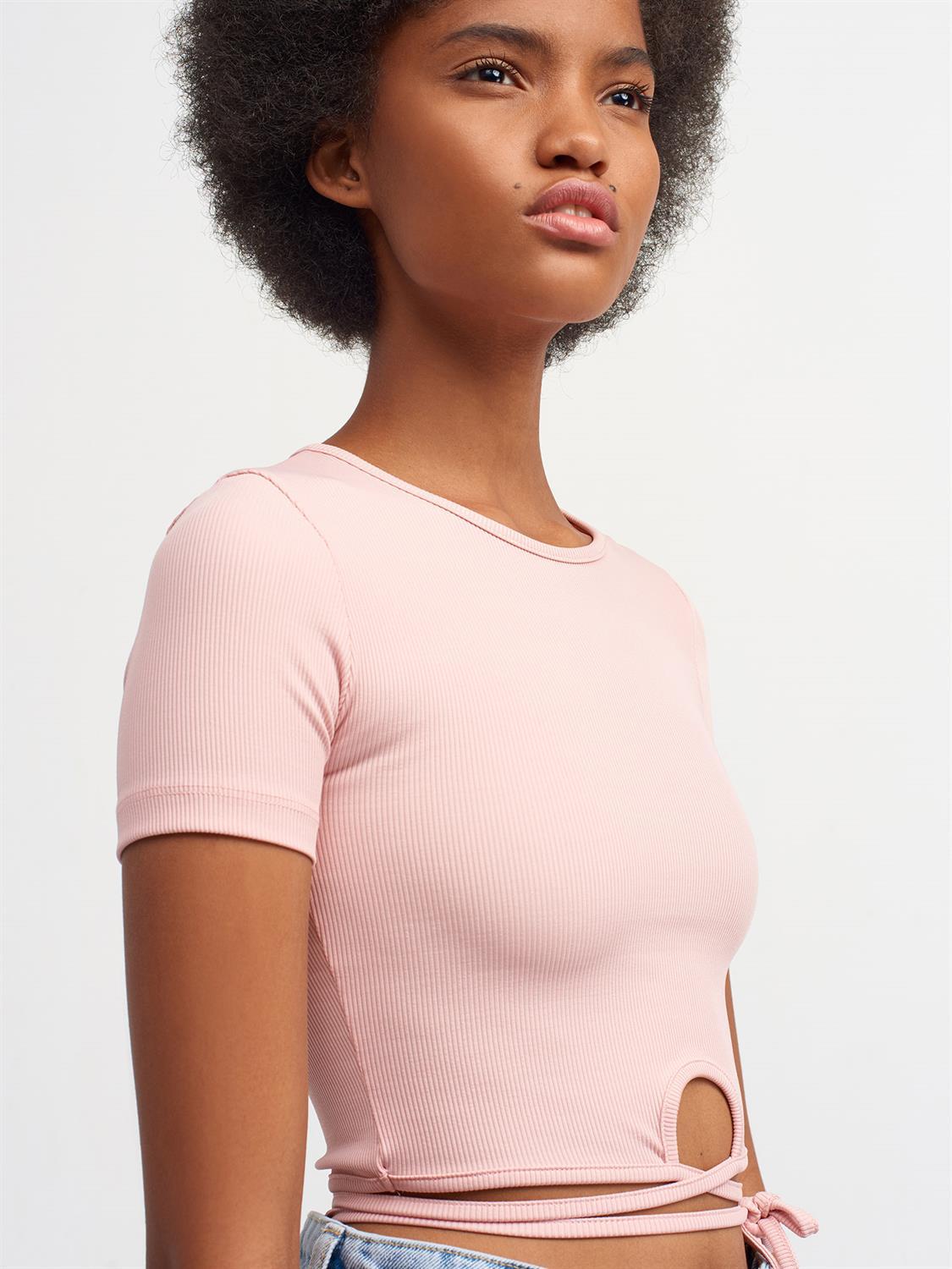 A stylish Lace Up Crop Top featuring a chic lace-up front design, made from a comfortable nylon-elastane blend.