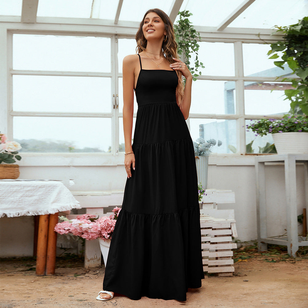 A beautiful Lace-Up Tiered Maxi Dress featuring a sleeveless design, tiered layers, and a backless style, perfect for formal occasions.