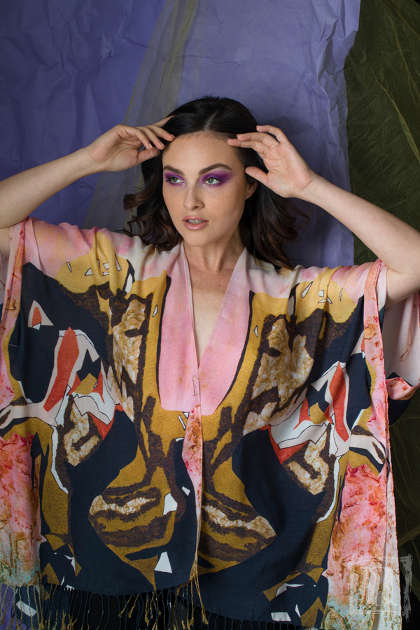 A luxurious 'Lady in the Golden Chair' Kimono made from soft 100% Modal fabric, featuring a flowing design suitable for various styling options.