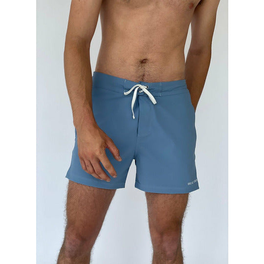 Laguna Shorts in blue, made from recycled ocean plastic, featuring three pockets and a comfortable fit.