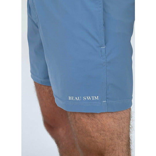 Laguna Shorts in blue, made from recycled ocean plastic, featuring three pockets and a comfortable fit.