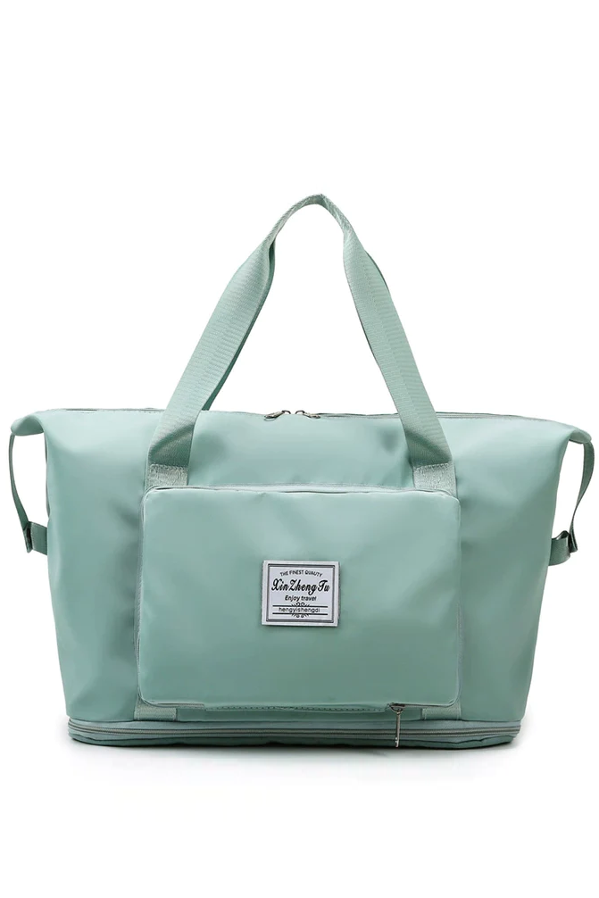 Larger sports bag ART2208 in light green with durable fabric, zip closure, and multiple pockets.