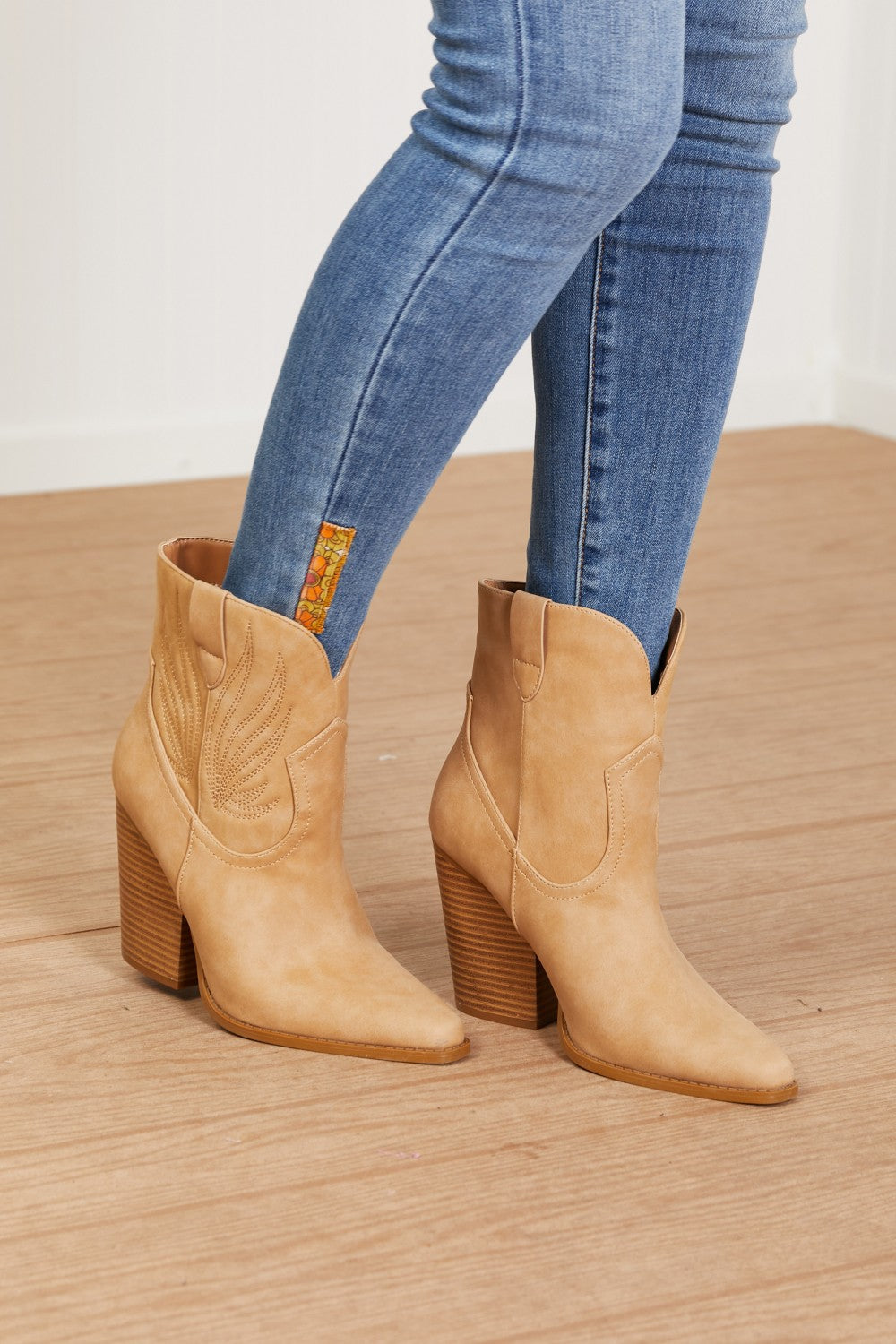 Lasso My Heart Cowboy Booties featuring a classic Western design with point toe and block heels in soft nubuck material.