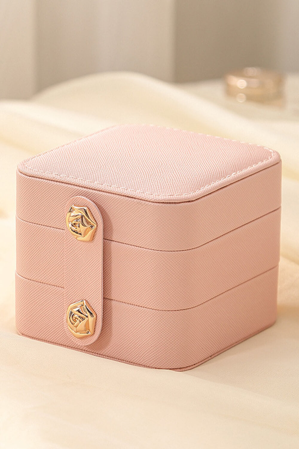 Layered Jewelry Storage Box made from durable PU material, featuring a stylish design and compact size for organizing jewelry.