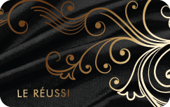 Le Reussi Gift Card displayed on a digital screen, showcasing its vibrant design and gift card code.