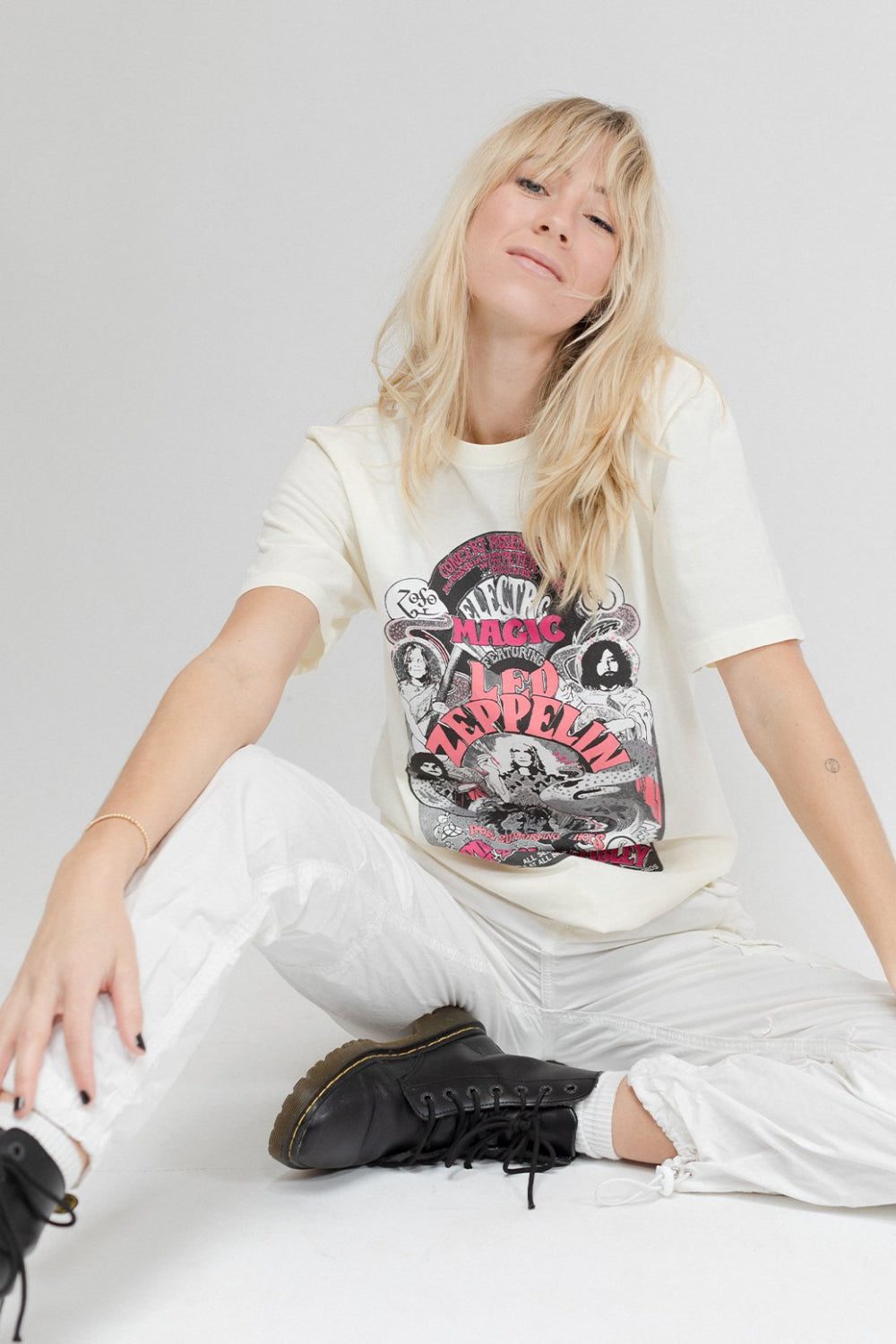 Led Zeppelin Electric Magic Tee in white featuring a vibrant graphic design, showcasing the band's iconic imagery.