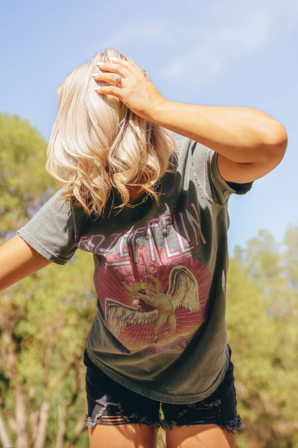 Led Zeppelin Sunkissed Timeless Tee in organic cotton, featuring a vintage sun-kissed look, perfect for stylish casual wear.