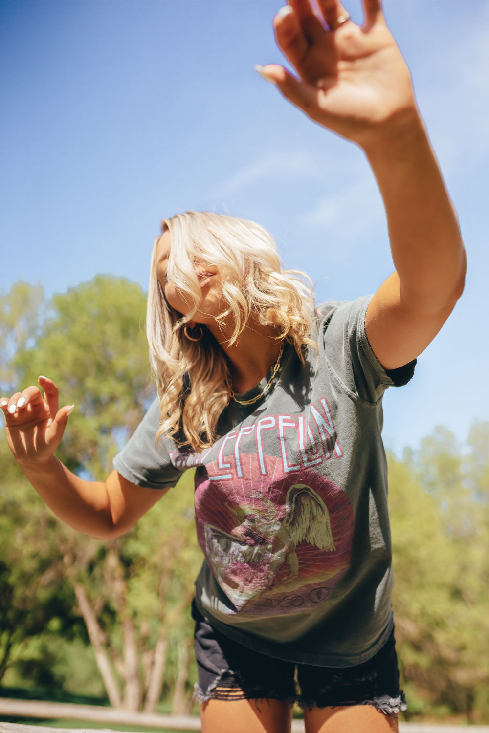 Led Zeppelin Sunkissed Timeless Tee in organic cotton, featuring a vintage sun-kissed look, perfect for stylish casual wear.