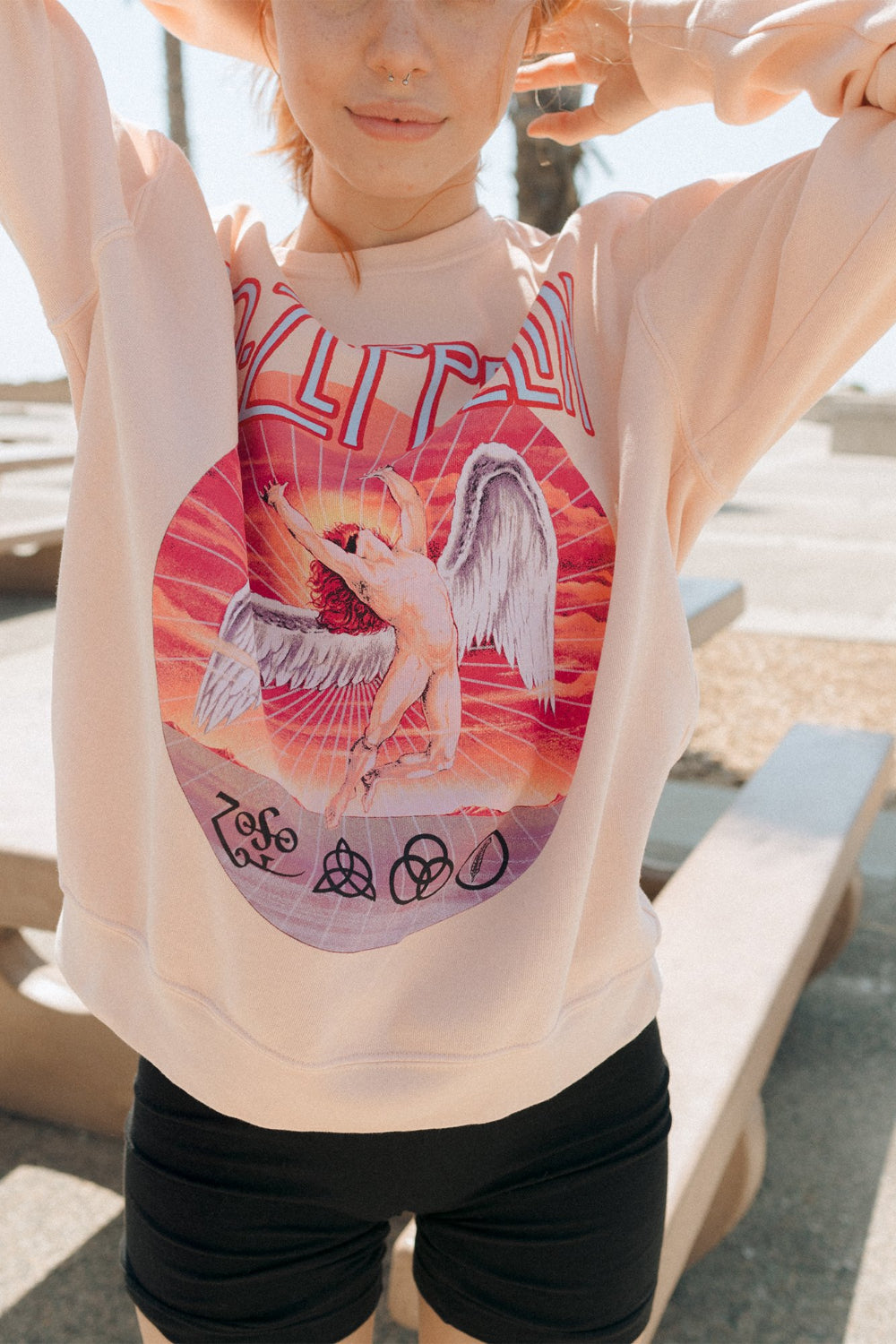 Pacific Pink Led Zeppelin Sweatshirt featuring a crew neck and raglan sleeves, made from 100% organic cotton.