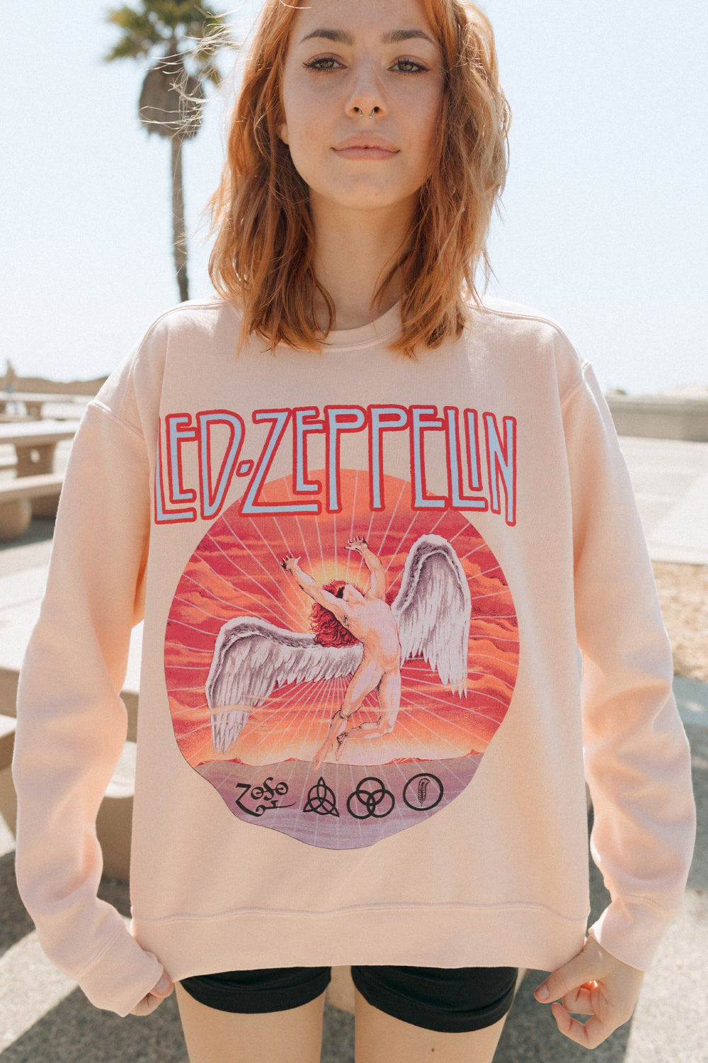 Pacific Pink Led Zeppelin Sweatshirt featuring a crew neck and raglan sleeves, made from 100% organic cotton.