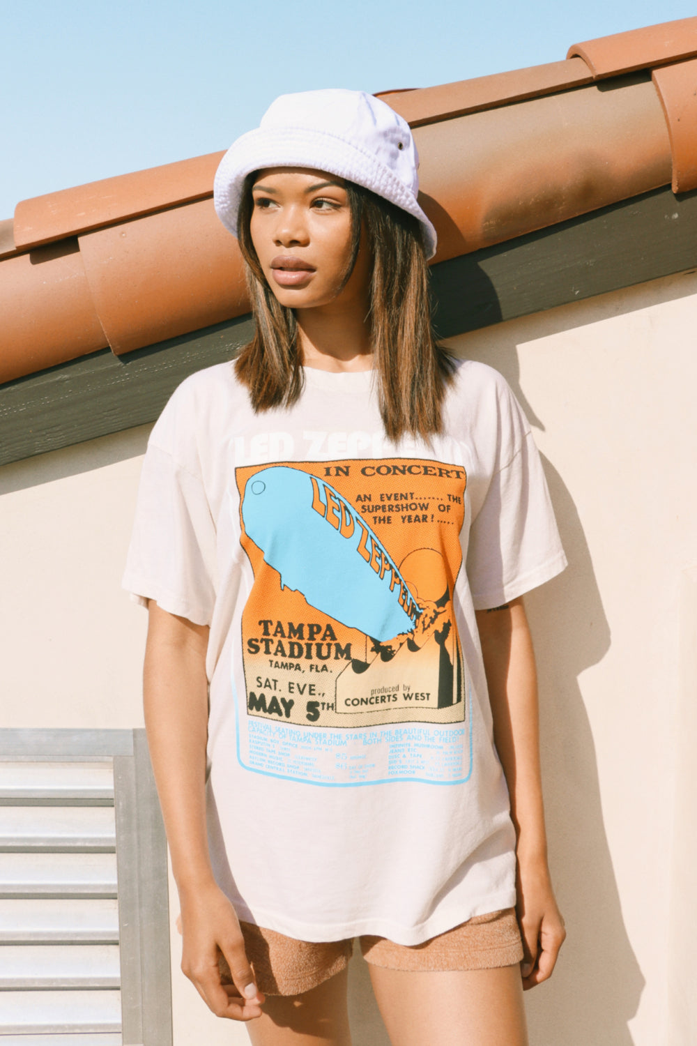 Led Zeppelin Tampa Stadium Boyfriend Tee in ivory color, showcasing a relaxed fit and vintage style, perfect for summer wear.