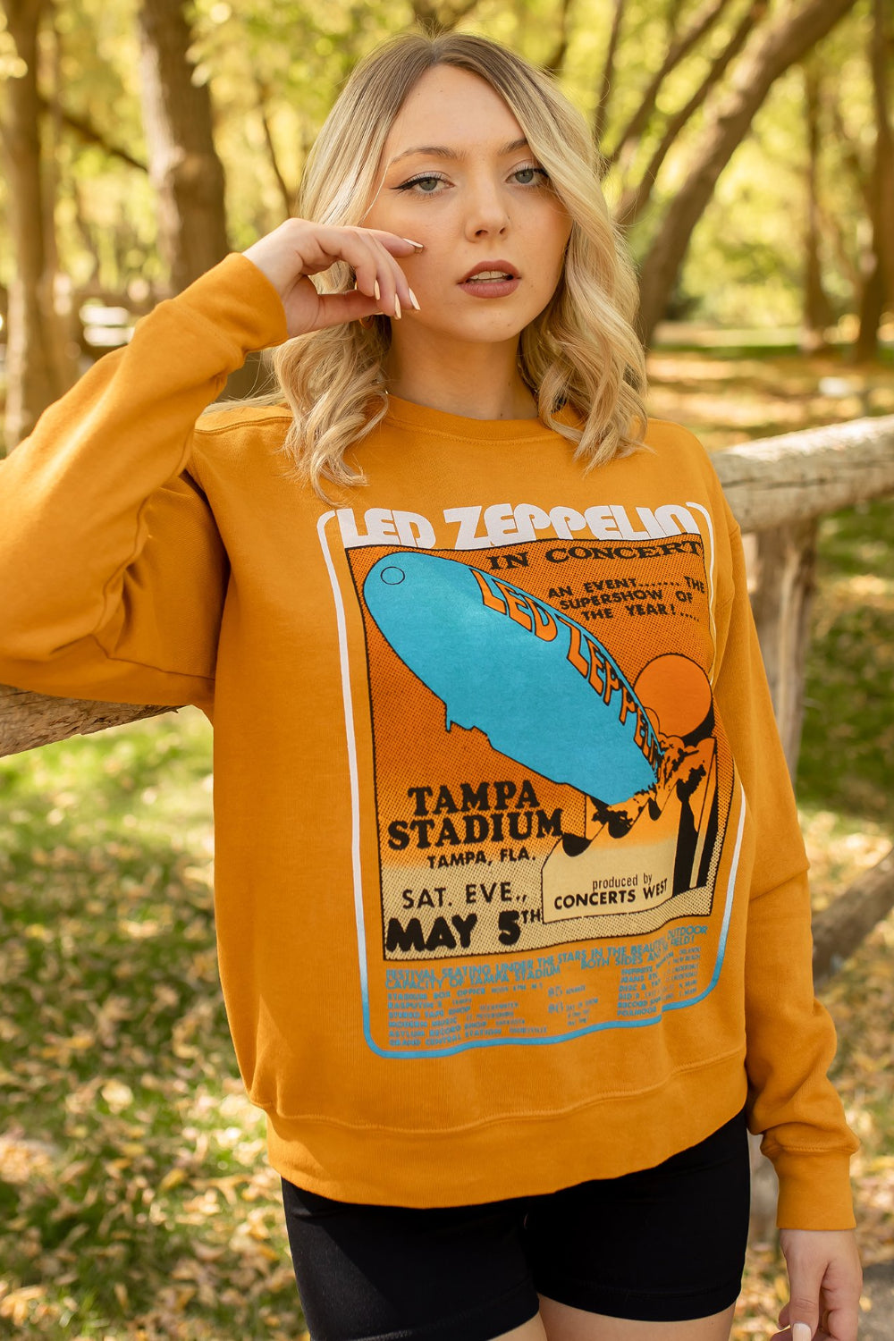 Led Zeppelin 'Tampa Stadium' sweatshirt in maple color with crew neck and raglan sleeves, featuring a bold Led Zeppelin graphic.