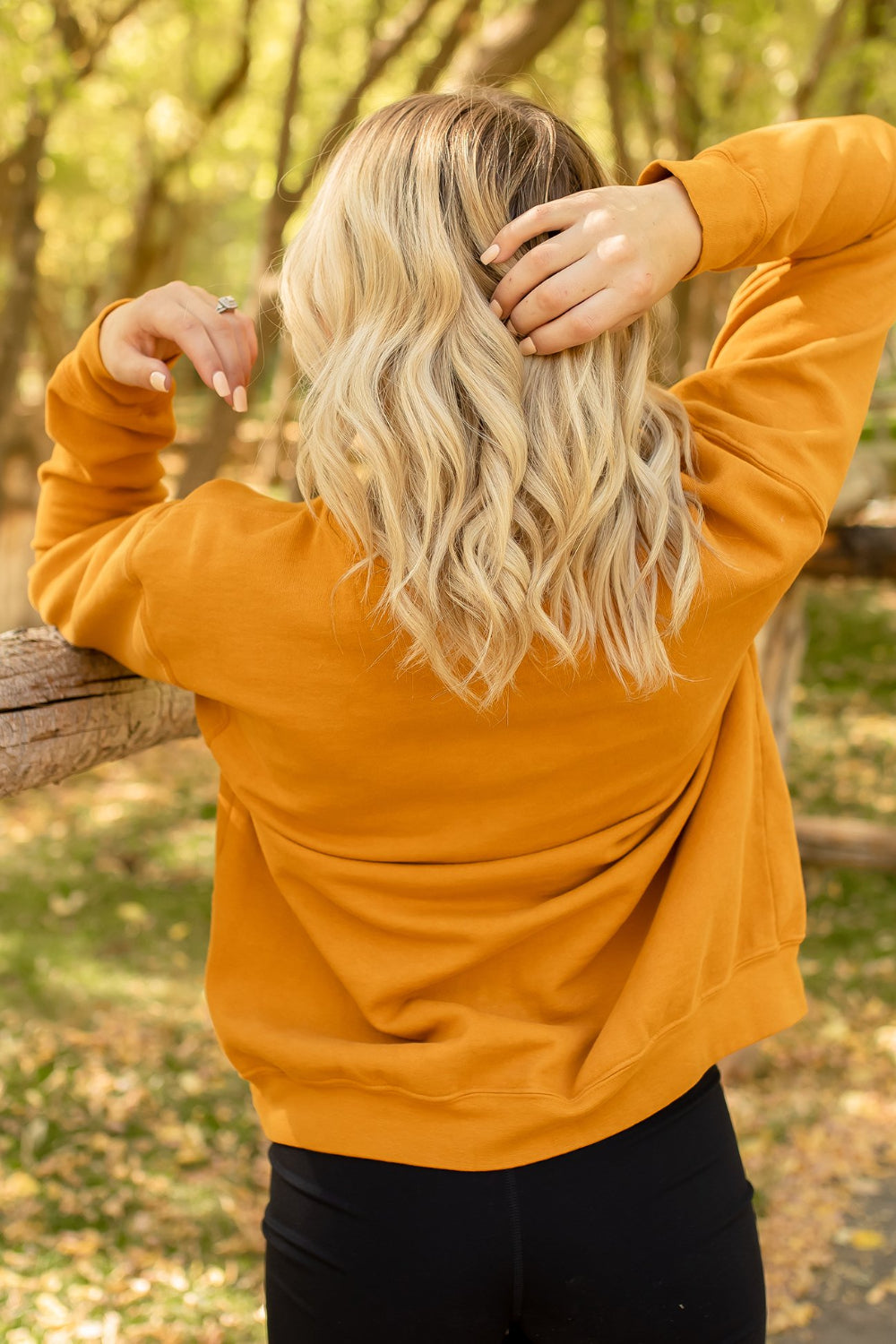 Led Zeppelin 'Tampa Stadium' sweatshirt in maple color with crew neck and raglan sleeves, featuring a bold Led Zeppelin graphic.