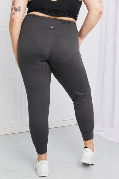 Leggings Depot Full Size Pocketed High Waist Pants in various colors, showcasing the high waist design and functional side pockets.