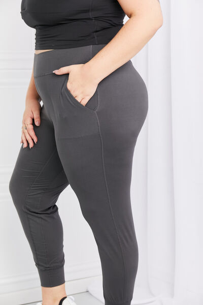 Leggings Depot Full Size Pocketed High Waist Pants in various colors, showcasing the high waist design and functional side pockets.