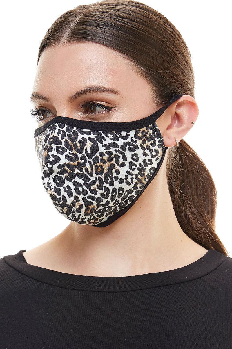 Leopard animal print fashion mask with ear loops, showcasing a stylish design and breathable fabric.