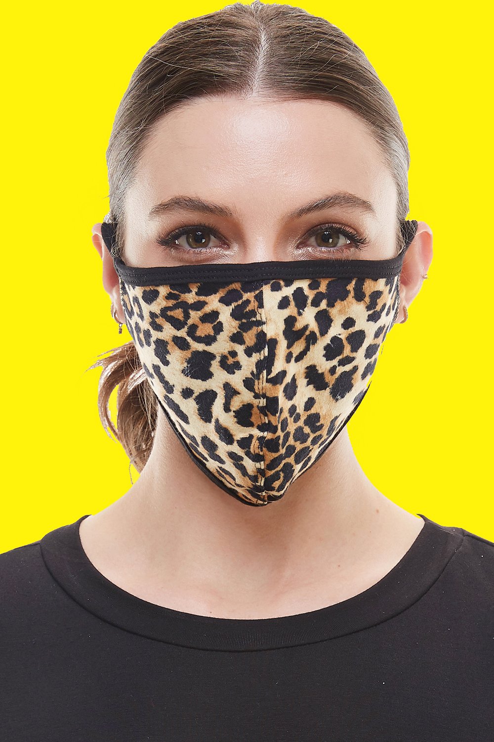 Leopard animal print fashion mask with ear loops, showcasing a stylish design and breathable fabric.