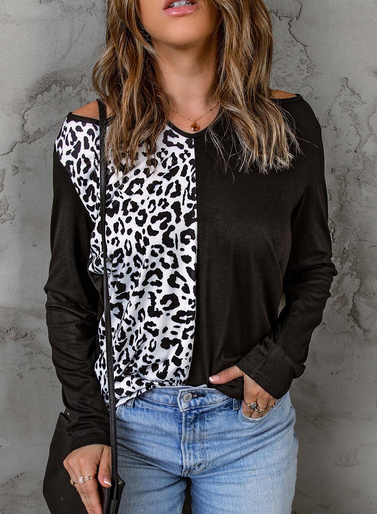 Leopard Color Block Crisscross Back Cold-Shoulder Top featuring a trendy leopard print and stylish crisscross back design.