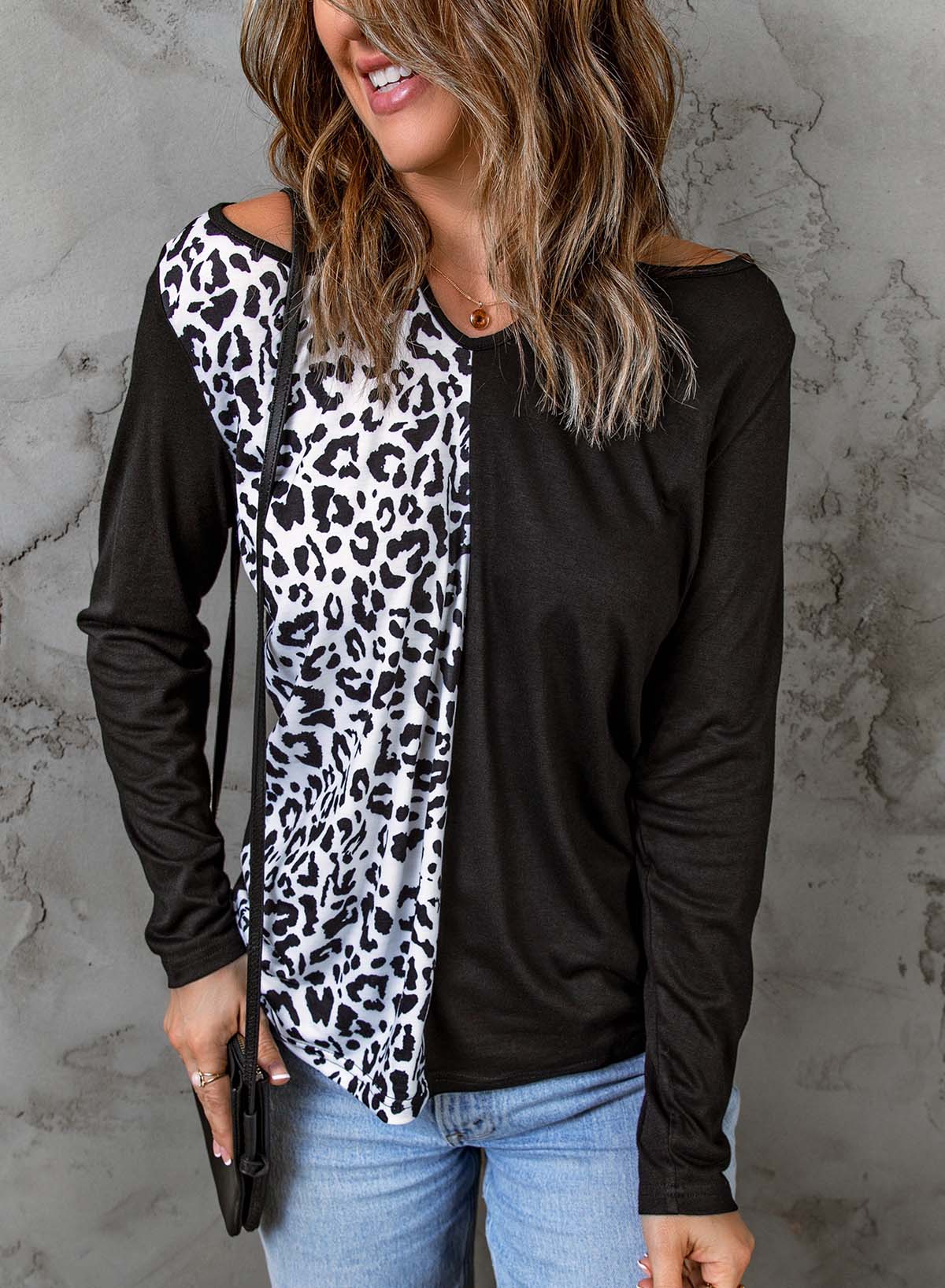 Leopard Color Block Crisscross Back Cold-Shoulder Top featuring a trendy leopard print and stylish crisscross back design.