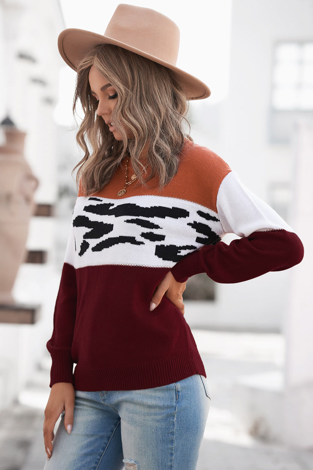 Leopard Color Block Ribbed Trim Dropped Shoulder Sweater displayed on a mannequin, showcasing its trendy animal print and casual style.