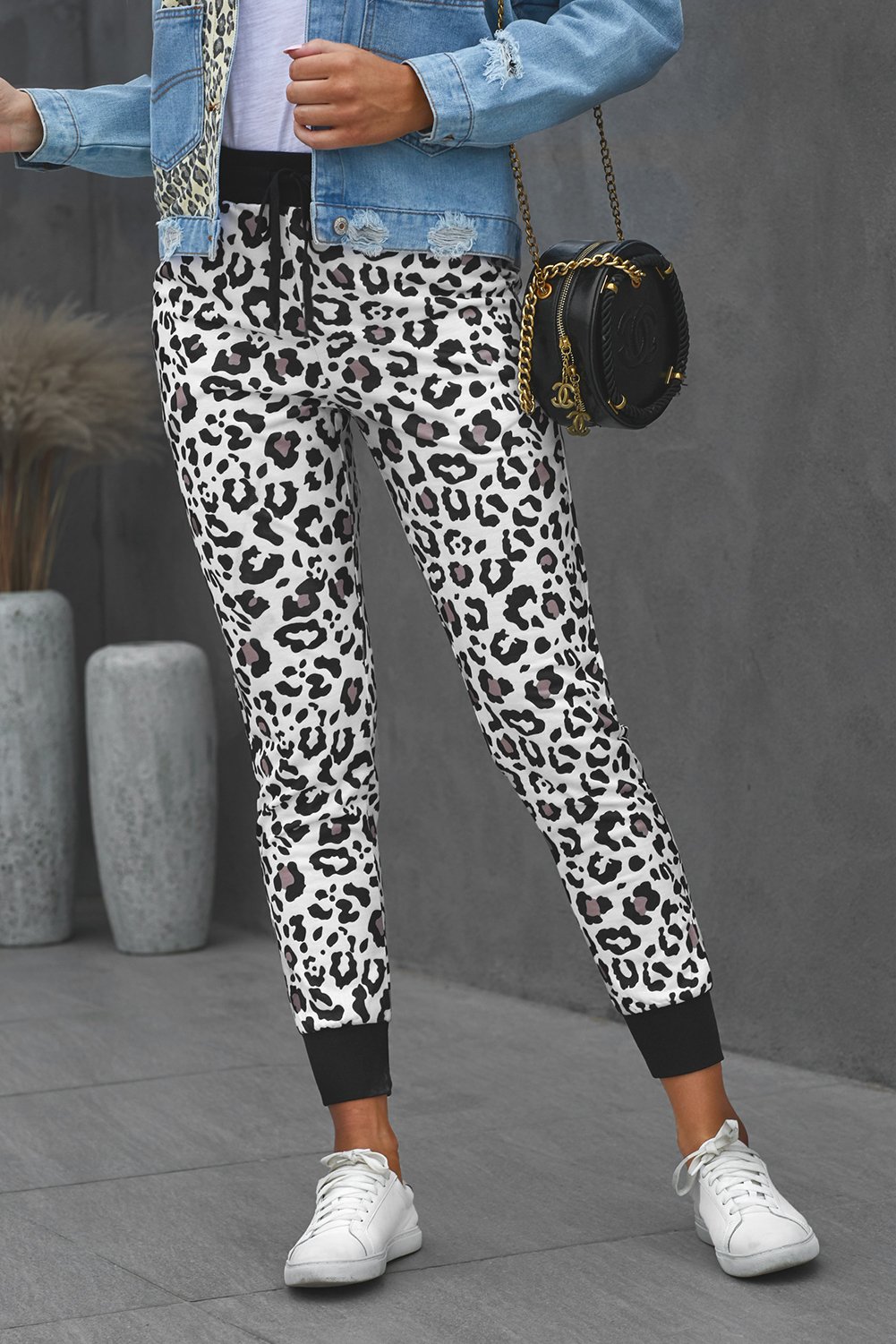 Leopard Cotton Pocketed Joggers featuring a trendy leopard print design, elastic waist, and side pockets for a stylish and comfortable fit.