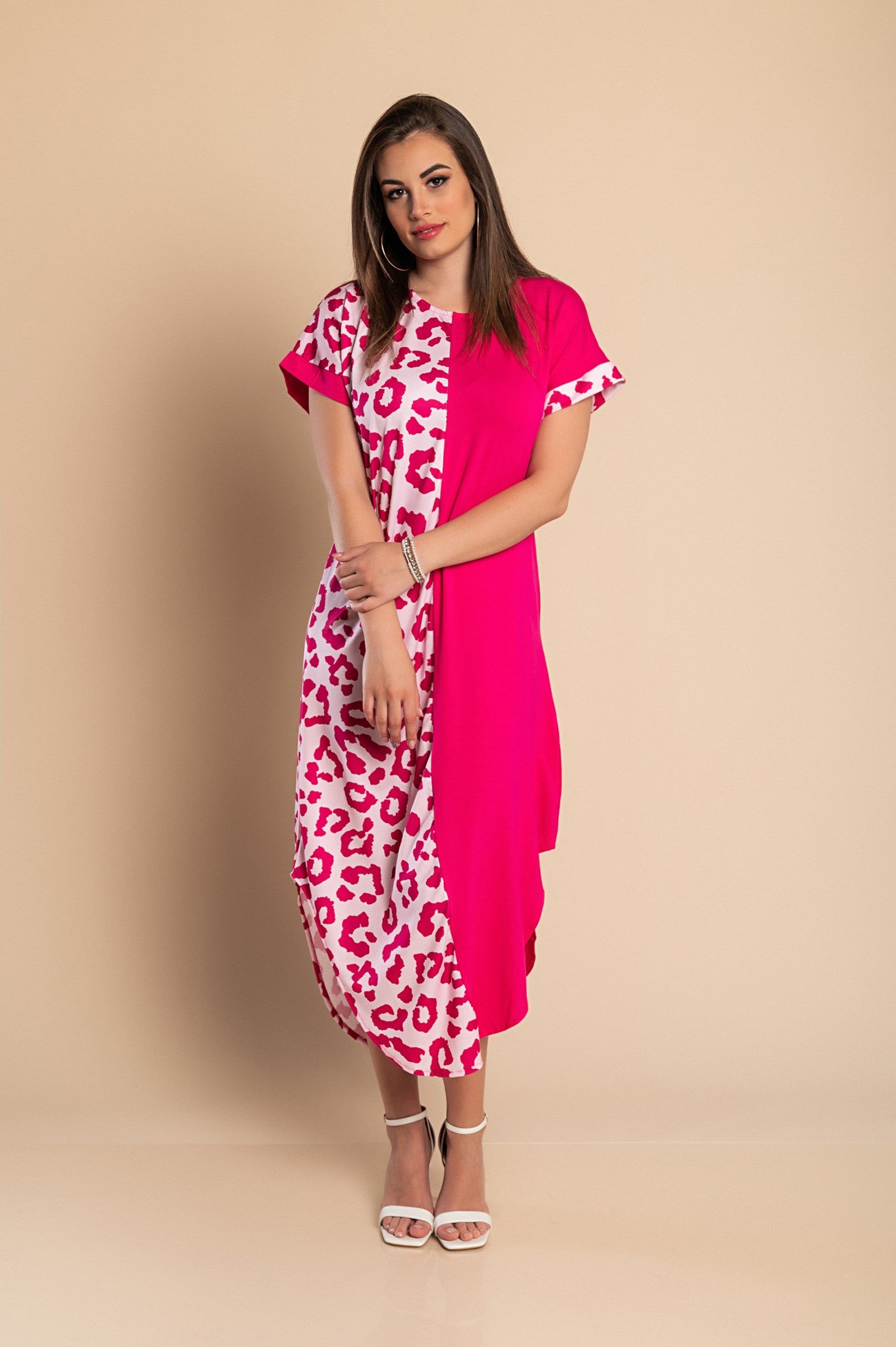 A pink leopard print elegant maxi dress featuring a round neckline, short sleeves, and side slits, made from soft lightweight fabric.