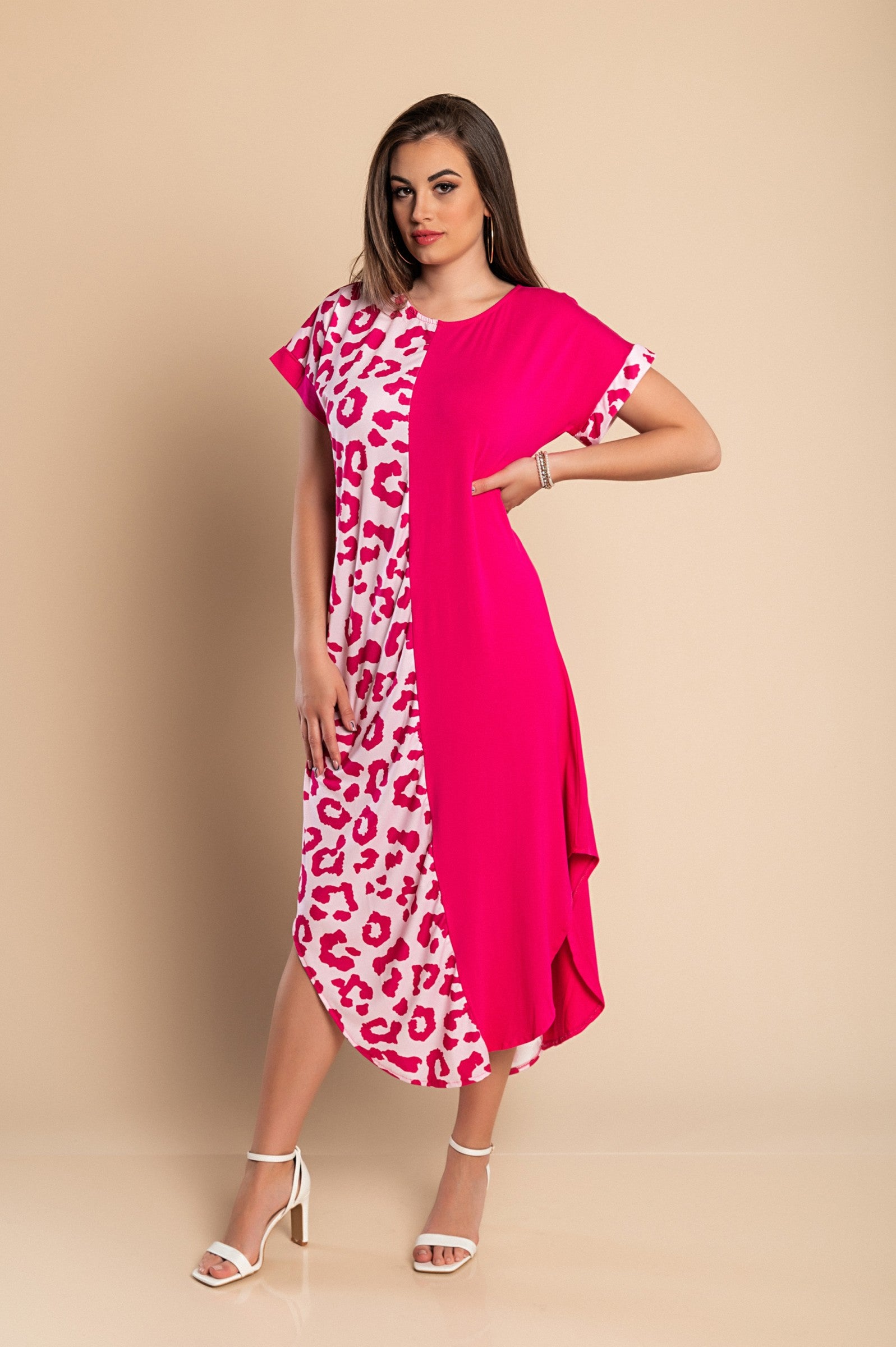 A pink leopard print elegant maxi dress featuring a round neckline, short sleeves, and side slits, made from soft lightweight fabric.