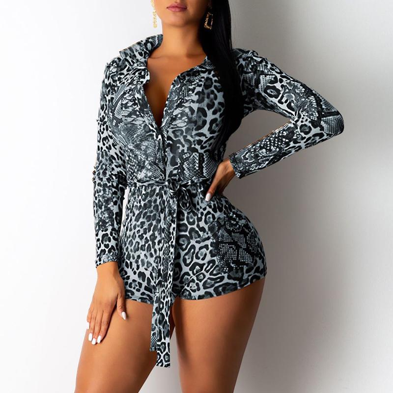 A stylish leopard print long sleeve bodycon playsuit for women, featuring a fitted design and sashes, perfect for autumn outings.