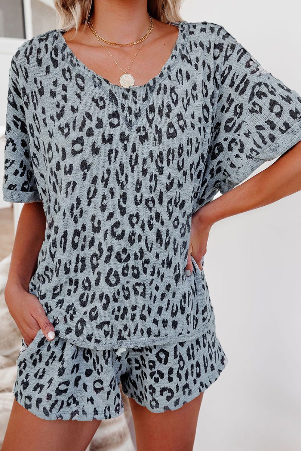 Leopard Print Rolled Sleeve Short Lounge Set featuring a relaxed silhouette and soft knit material, perfect for lounging.