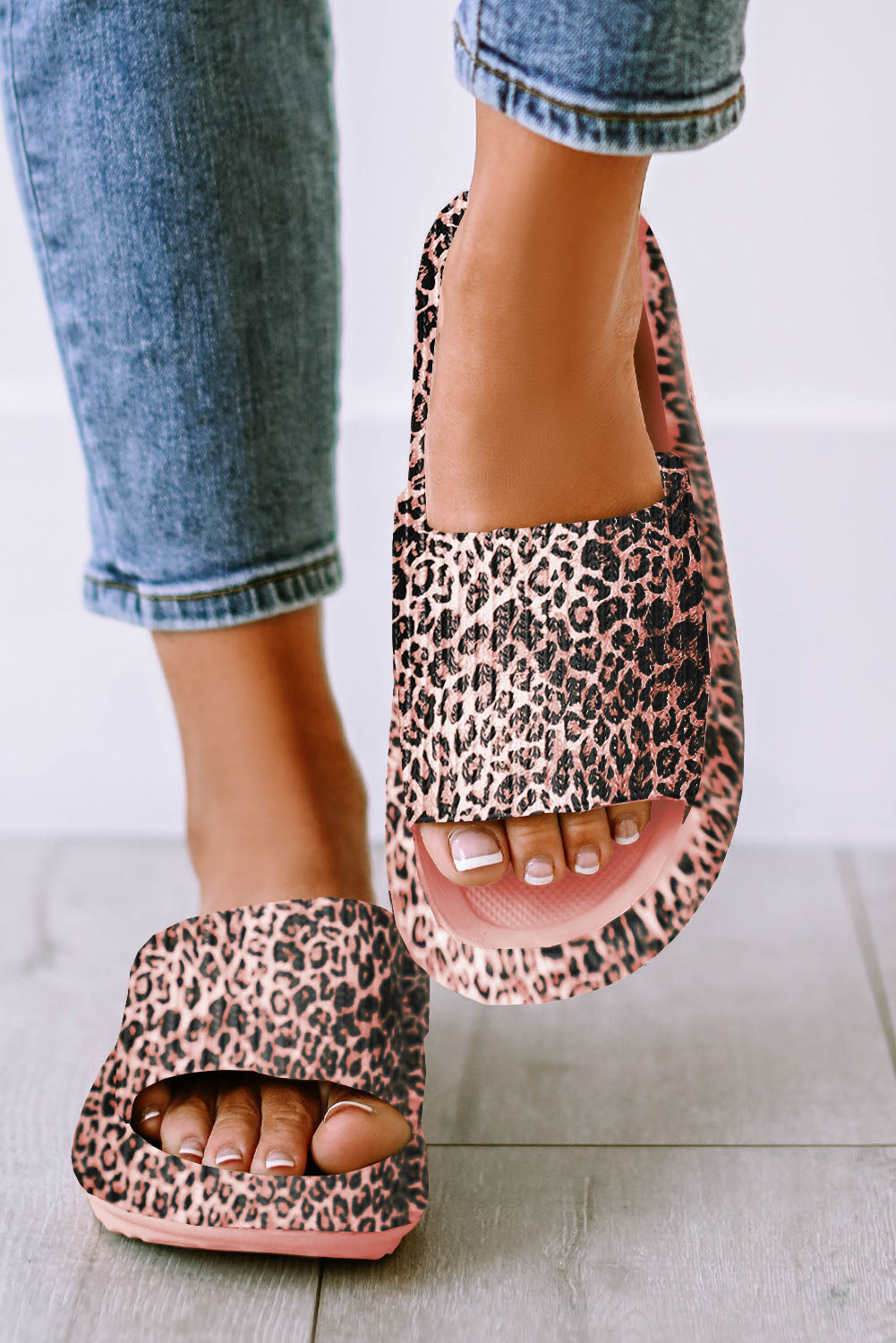 Leopard print thick sole slip on slippers showcasing stylish design and comfort features.