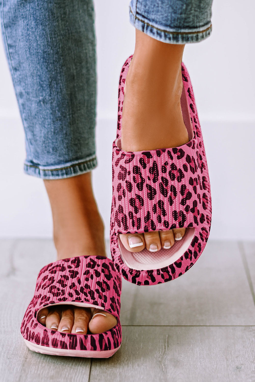 Leopard print thick sole slip on slippers showcasing stylish design and comfort features.