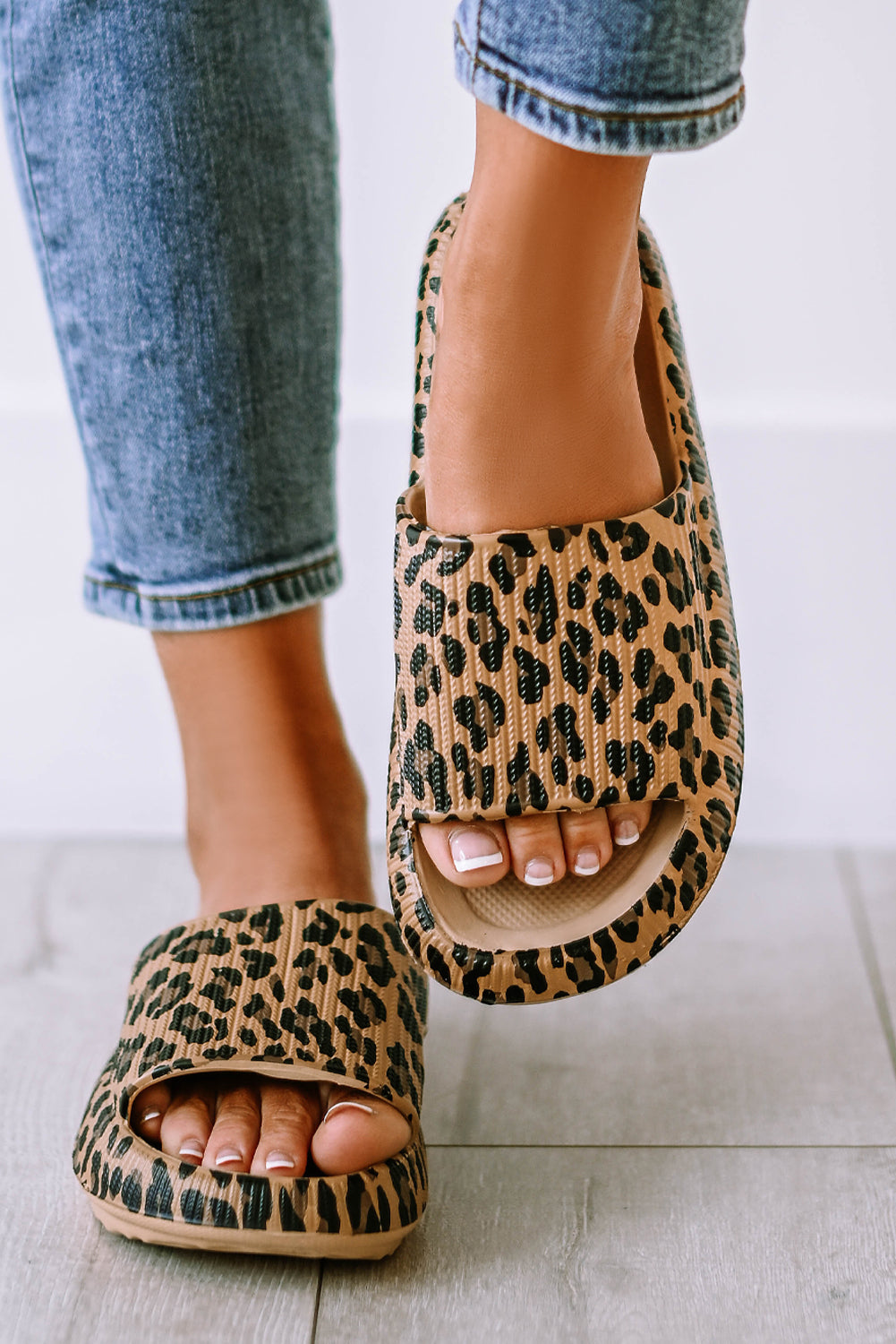 Leopard print thick sole slip on slippers showcasing stylish design and comfort features.