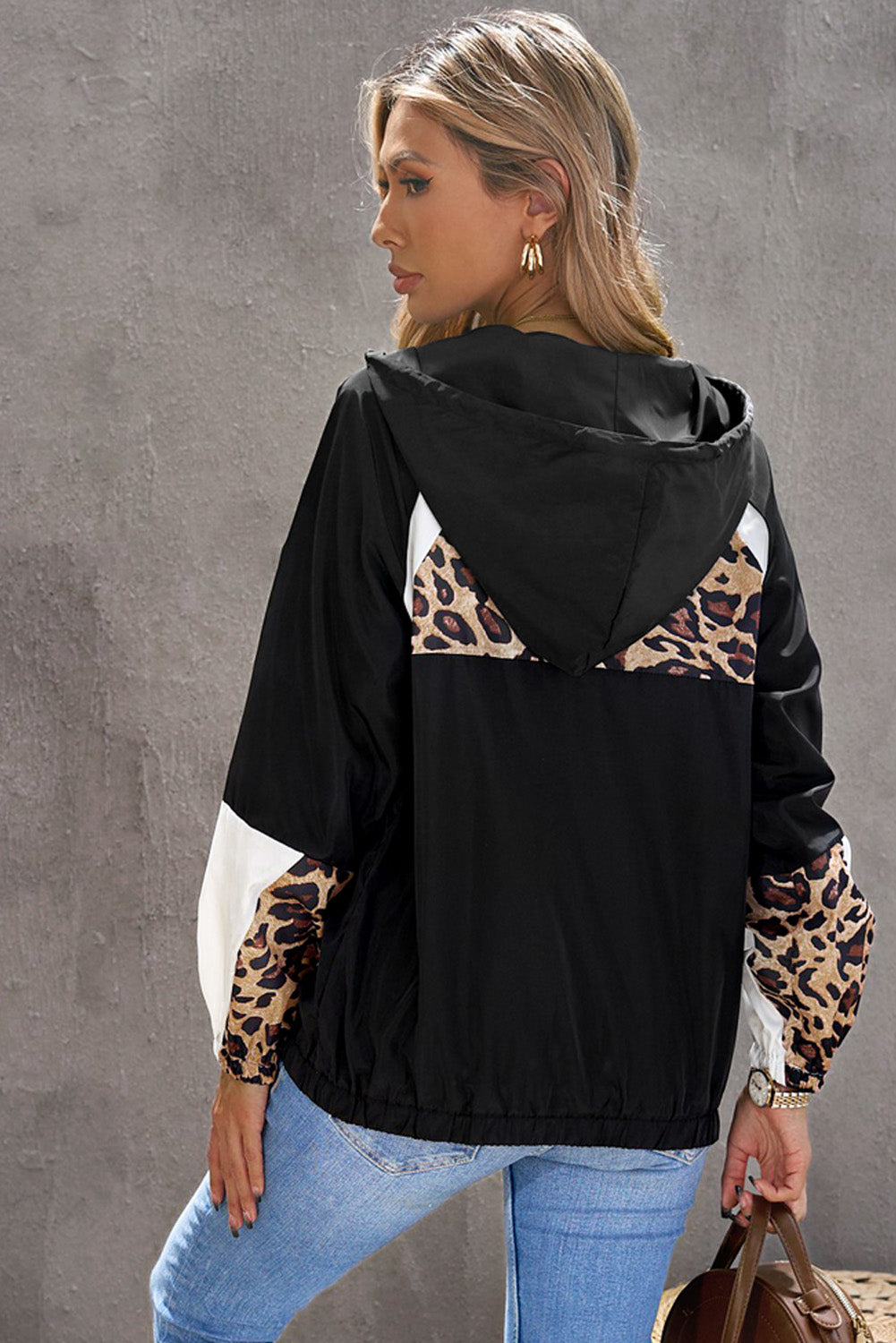 Leopard Quarter-Zip Hoodie featuring a stylish leopard print pattern, hooded neckline, and long sleeves, perfect for casual wear.