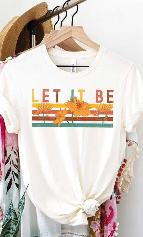 Let It Be Graphic Tee PLUS in white and cream colors, showcasing a stylish graphic design, perfect for casual wear.